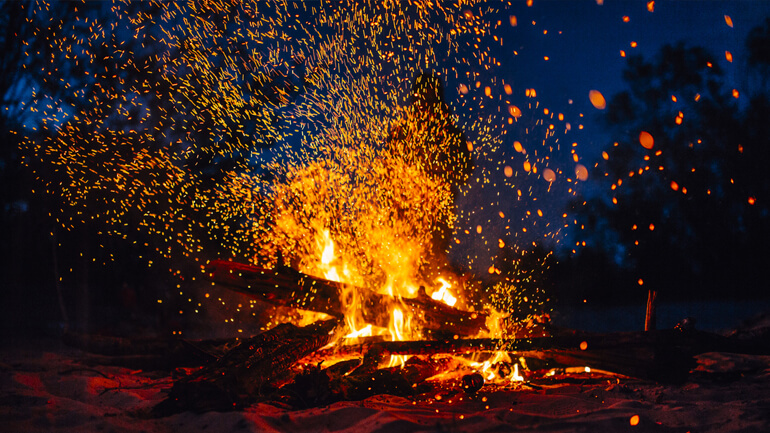 Camp fire at night